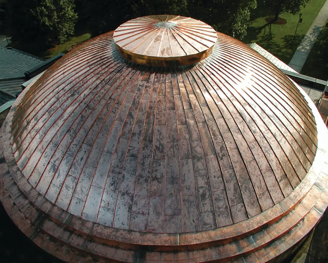 Craftsman Roofing crew installing a new roof in On Top of the World